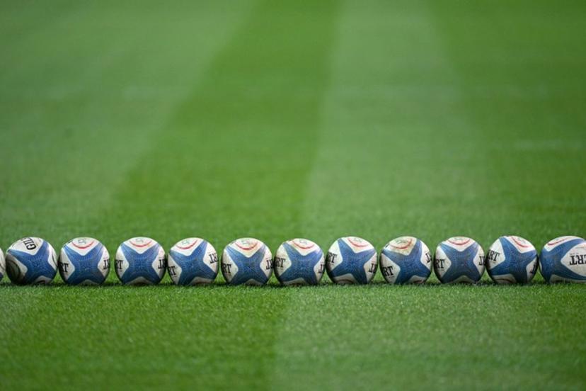 A picture shows rugby ball on the pitch of the Friuli stadium before the Autumn Nations Series international rugby union match between Italy and Australia (wallabies) in Udine on November 8, 2025.  Stefano RELLANDINI / AFP