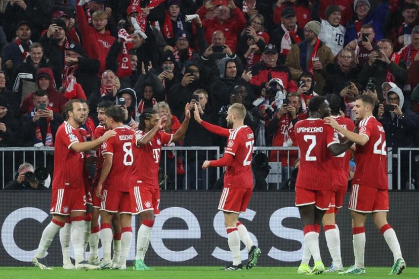 Bayern Munich's Canadian defender #19 Alphonso Davies (hidden) celebrates scoring the 1-1 goal with his teammates during the UEFA Champions League football match between FC Bayern Munich and Arsenal FC in Munich, southern Germany on October 21, 2026.  Karl-Josef HILDENBRAND / AFP