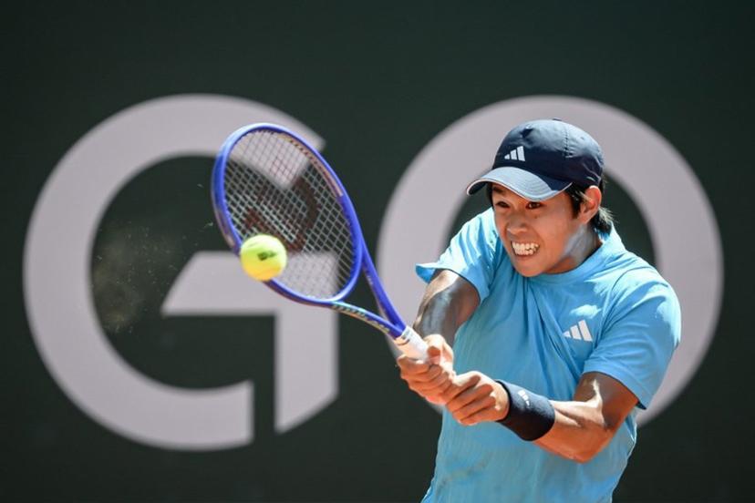 USA's Learner Tien returns a ball to Argentine's Mariano Navone during their men's singles final tennis match at the ATP 250 Geneva Open tennis tournament in Geneva on May 23, 2026.  Fabrice COFFRINI / AFP