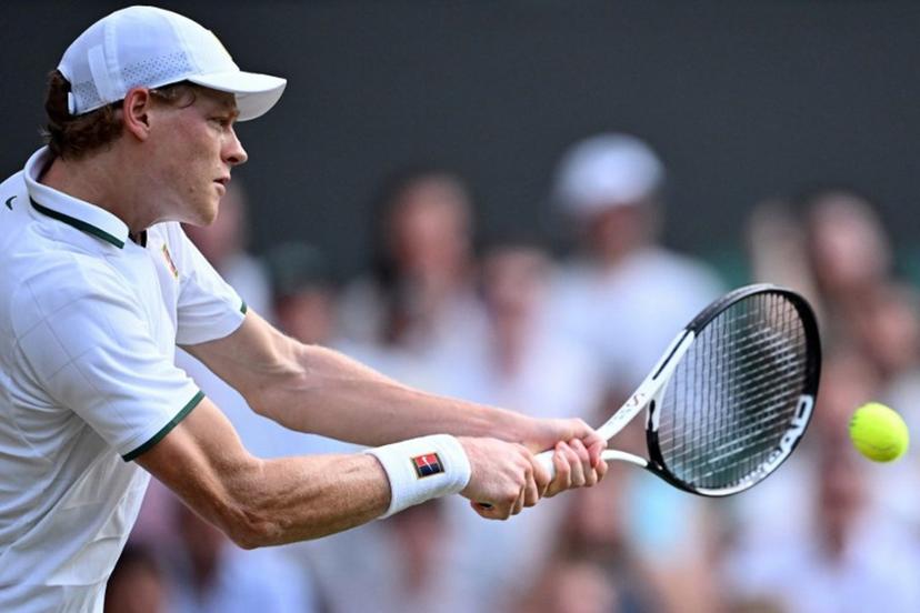 Italy's Jannik Sinner returns to Japan's Shintaro Mochizuki during their men's singles round of 16 tennis match on the seventh day of the 2026 Wimbledon Championships at The All England Lawn Tennis and Croquet Club in Wimbledon, southwest London, on July 5, 2026.  Kirill KUDRYAVTSEV / AFP