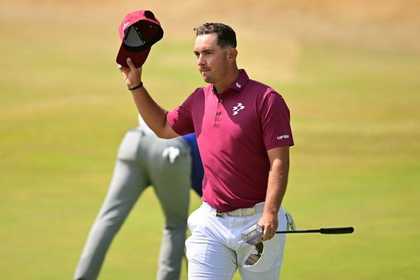 Australia's Lucas Herbert reacts on the 18th green after his -8, 62, tying the Open Championship low score record on day two of the 154th Open Golf championship at Royal Birkdale Golf Club near Southport in north-west England on July 17, 2026.  ANDY BUCHANAN / AFP