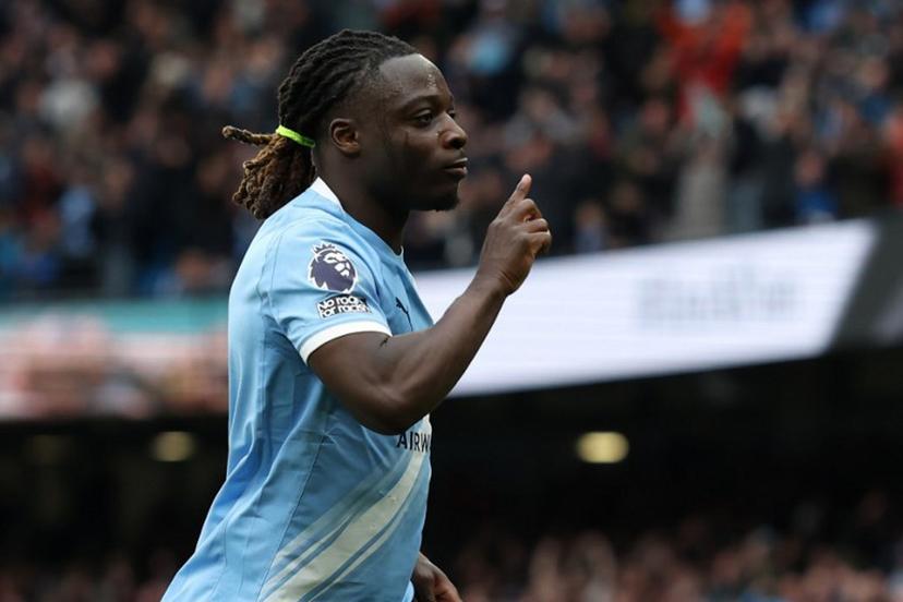 Manchester City's Belgian midfielder #11 Jeremy Doku celebrates after scoring the opening goal during the English Premier League football match between Manchester City and Brentford at the Etihad Stadium in Manchester, north west England, on May 9, 2026.  Darren Staples / AFP