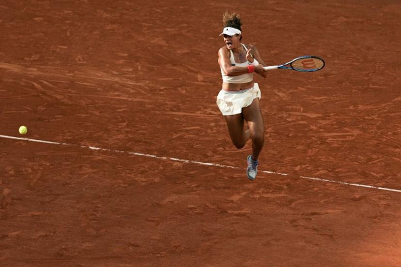 Egypt's Mayar Sherif plays a forehand return to US Coco Gauff during their women's singles match on day 5 of the French Open tennis tournament on Court Suzanne-Lenglen at the Roland-Garros Complex in Paris on May 28, 2026.  Dimitar DILKOFF / AFP