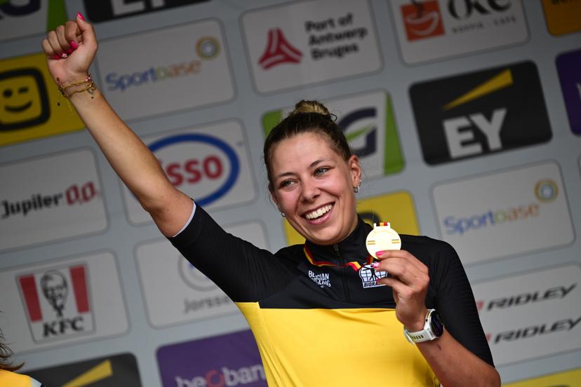Belgian Shari Bossuyt of AG Insurance-Soudal Team celebrates on the podium with the gold medal after winning the women's elite race (137km) at the Belgian Cycling Championships, in Brasschaat, on Sunday 28 June 2026. BELGA PHOTO TOM GOYVAERTS