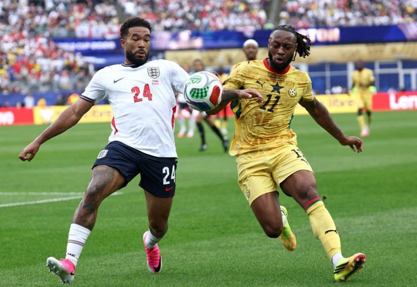 England's defender #24 Reece James (L)  fights for the ball with Ghana's forward #11 Antoine Semenyo  during the 2026 World Cup Group L football match between England and Ghana at the Boston Stadium in Foxborough on June 23, 2026.   FRANCK FIFE / AFP
