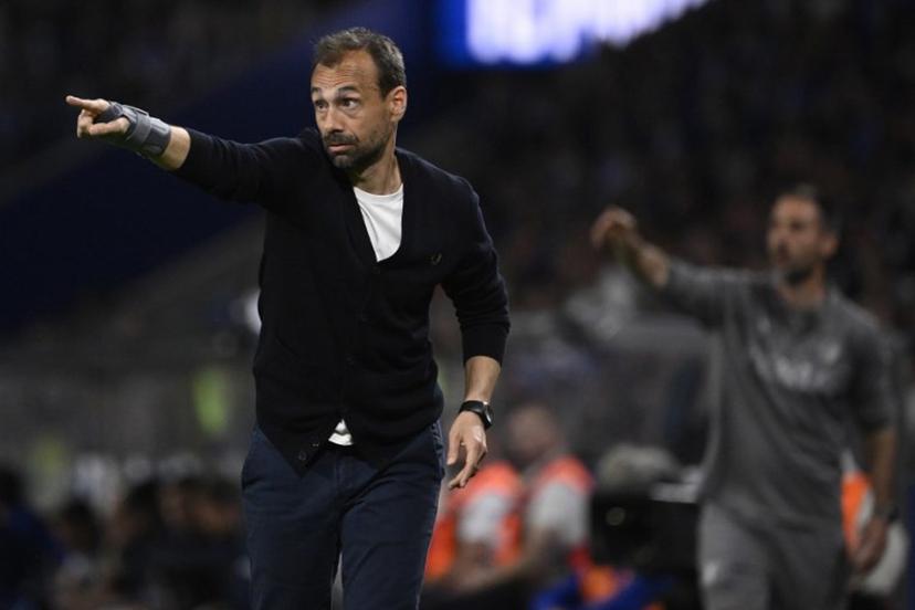 (FILES) FC Famalicão's Portuguese coach Hugo Oliveira gestures during the Portuguese League football match between FC Porto and FC Famalicao at Dragao stadium in Porto on April 4, 2026. Portuguese coach Hugo Oliveria was appointed new head coach of RC Starsbourg Alsace announced the club on July 12, 2026. Miguel RIOPA / AFP