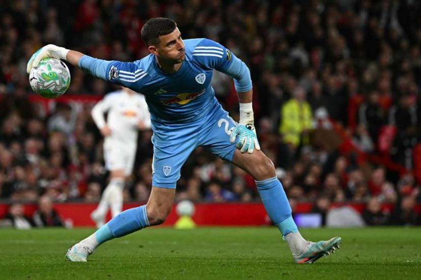 Leeds United's English goalkeeper #26 Karl Darlow throws the ball out during the English Premier League football match between Manchester United and Leeds United at Old Trafford in Manchester, north west England, on April 13, 2026.  Paul ELLIS / AFP