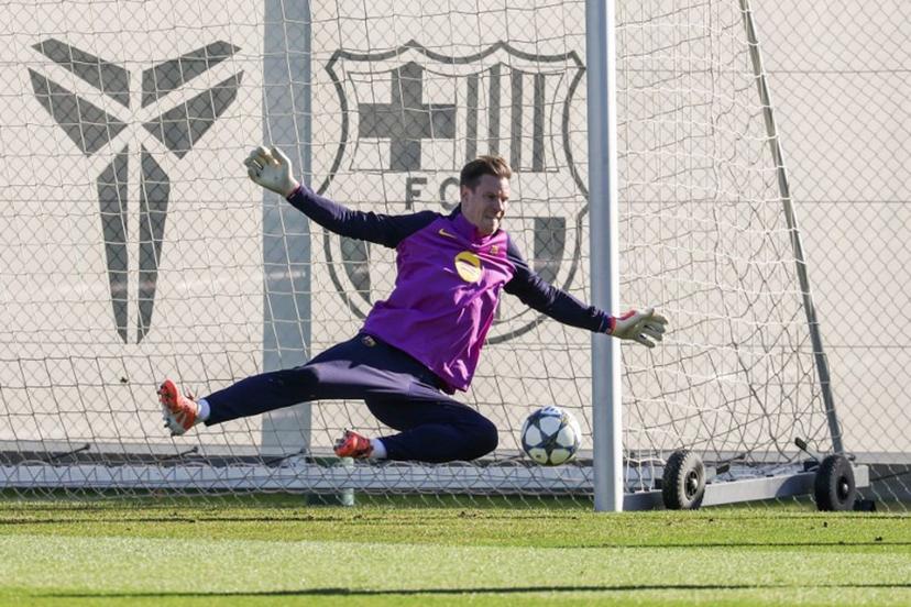 Barcelona's German goalkeeper # Marc-Andre Ter Stegen attends a training session on the eve of the UEFA Champions League league phase day 6 football match between FC Barcelona and Eintracht Frankfurt at the Joan Gamper training ground in Sant Joan Despi, near Barcelona, on December 8, 2025.  Lluis GENE / AFP