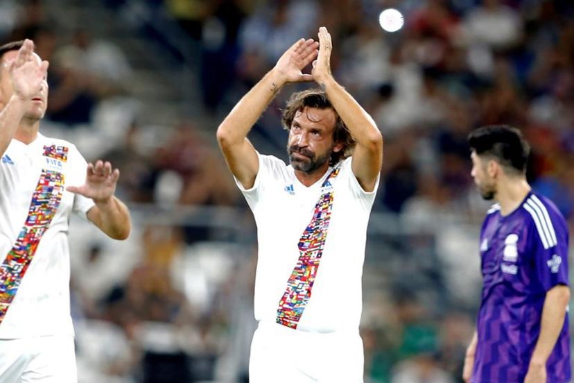 Fifa Legend's Italian midfielder Andrea Pirlo (C) celebrates after scoring during the 'Game of Legends' exhibition friendly football game between the 'Legends of Mexico' and 'FIFA International Legends', at BBVA Stadium in Monterrey, Nuevo Leon state, Mexico, on September 20, 2024.  Julio Cesar AGUILAR / AFP