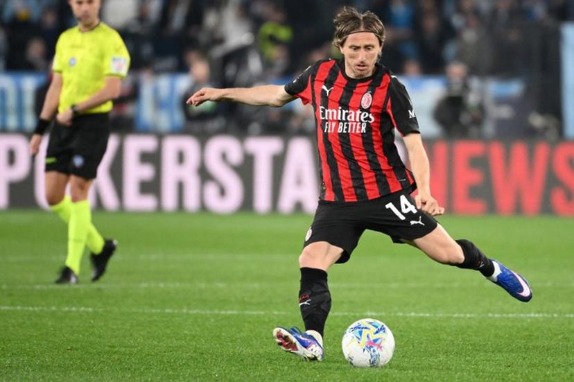 AC Milan's Croatian midfielder #14 Luka Modric kicks the ball during the Italian Serie A football match between Lazio and AC Milan at the Olympic Stadium in Rome on March 15, 2026.  Alberto PIZZOLI / AFP