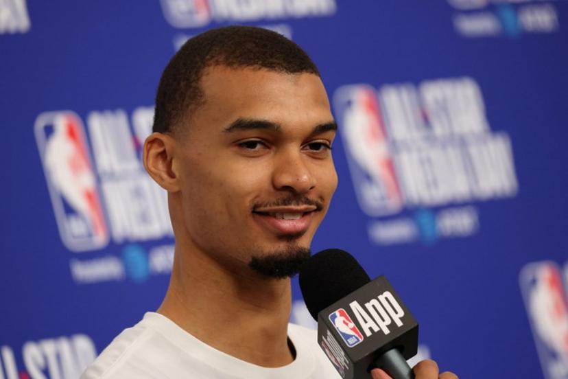 French basketball player Victor Wembanyama of the San Antonio Spurs speaks to the media during the NBA All-Star media day at the Intuit Dome in Inglewood, California, on February 14, 2026.  Patrick T. Fallon / AFP