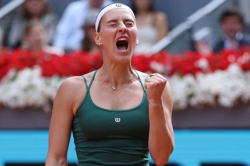 Ukraine's Marta Kostyuk reacts as she plays against Russia's Mirra Andreeva during the 2026 WTA Tour Madrid Open tennis tournament final singles match at the Caja Magica in Madrid, on May 2, 2026.  Thomas COEX / AFP