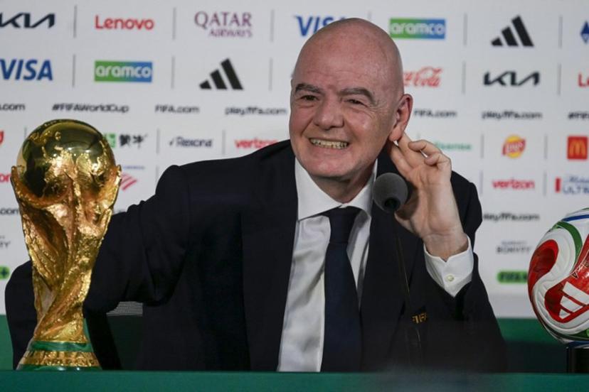 FIFA President Gianni Infantino gestures during a press conference with the World Cup trophy on the eve of the opening match of the 2026 World Cup football tournament at Mexico city stadium in Mexico City on June 10, 2026.  Alfredo ESTRELLA / AFP