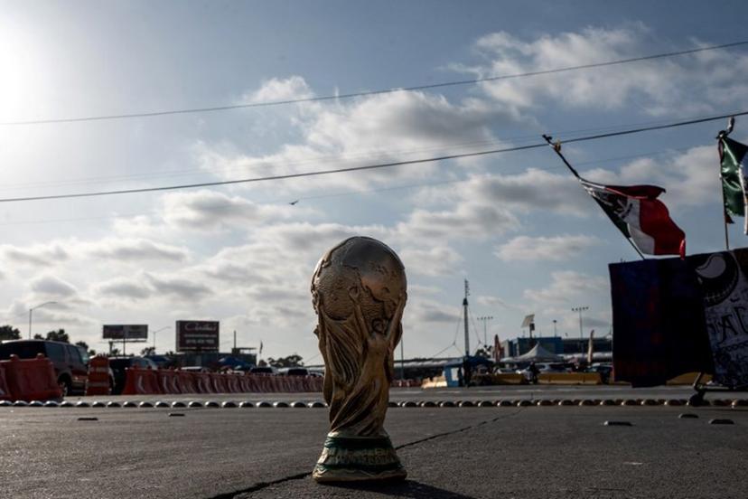 A World Cup trophy souvenir is pictured on a street in Tijuana, Baja California state, Mexico on May 23, 2026. Iran are moving their World Cup training base to Tijuana, Mexico, after football's world governing body FIFA approved a request to transfer it from Tucson, Arizona, the head of Iran's football federation Mehdi Taj said on May 23, 2026.  Chris Noyola / AFP