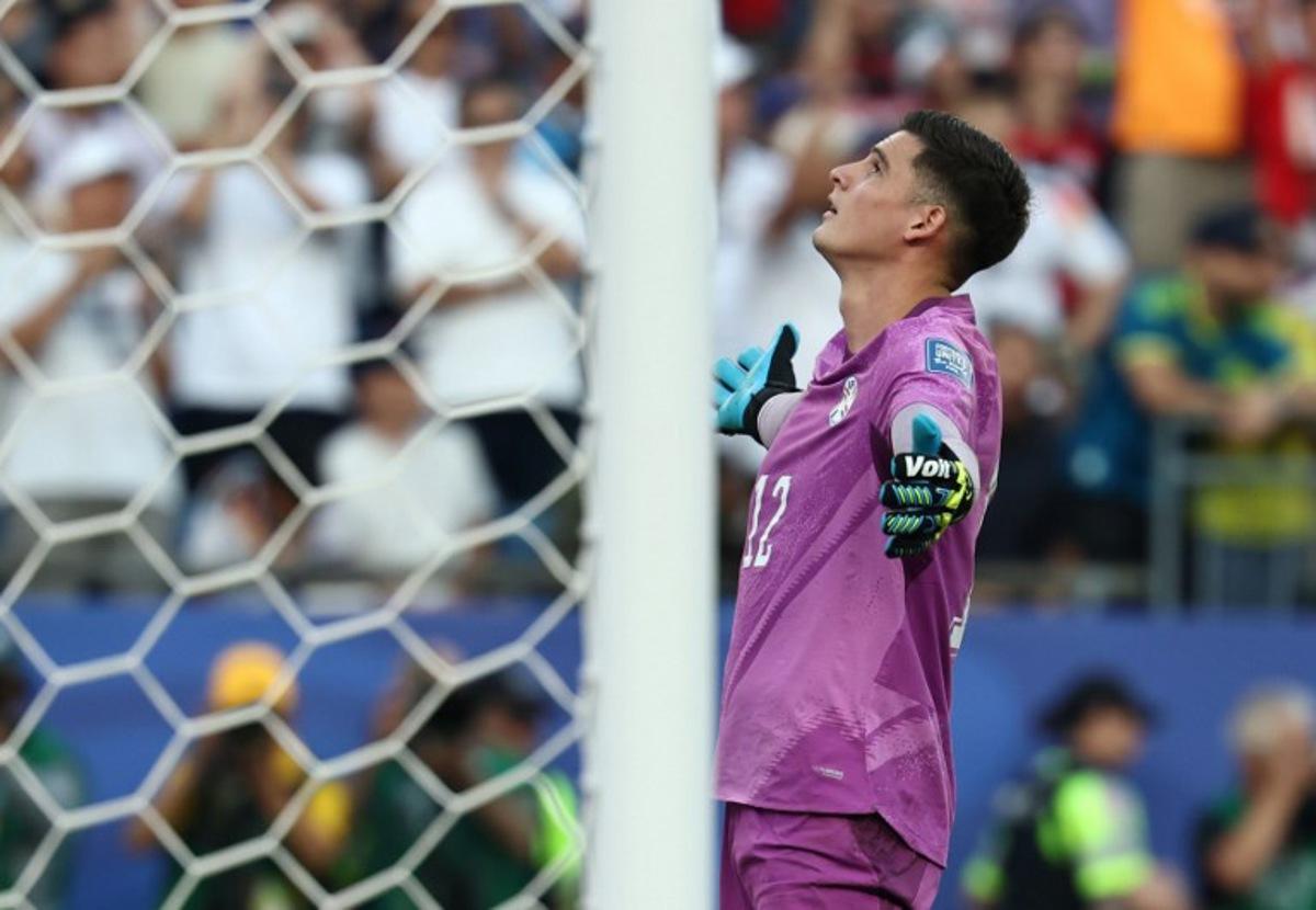 Paraguay's goalkeeper #12 Orlando Gill (L) reacts after saving a penalty by Germany's forward #11 Nick Woltemade (out of frame) in the shootout during the 2026 World Cup round of 32 football match between Germany and Paraguay at the Boston Stadium in Foxborough on June 29, 2026.   FRANCK FIFE / AFP