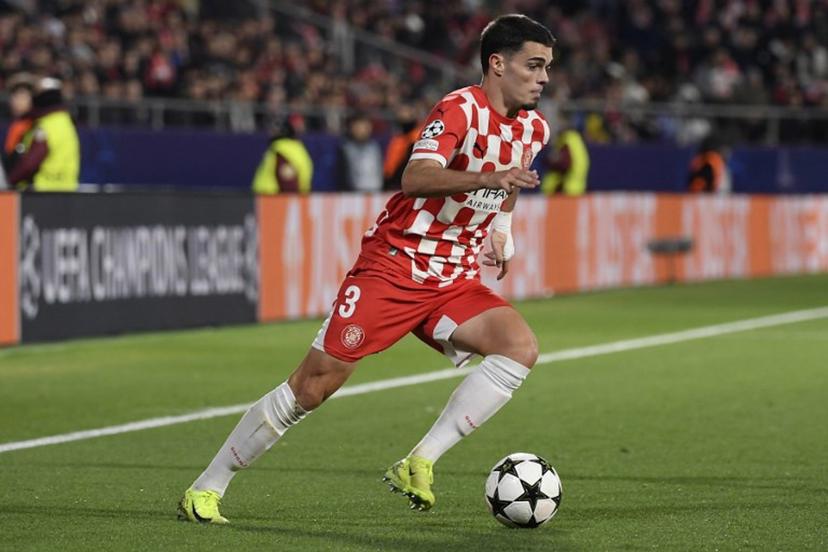 Girona's Spanish defender #03 Miguel Gutierrez controls the ball during the UEFA Champions League, league phase football match between Girona FC and Liverpool FC at the Montilivi stadium in Girona on December 10, 2024.   Josep LAGO / AFP