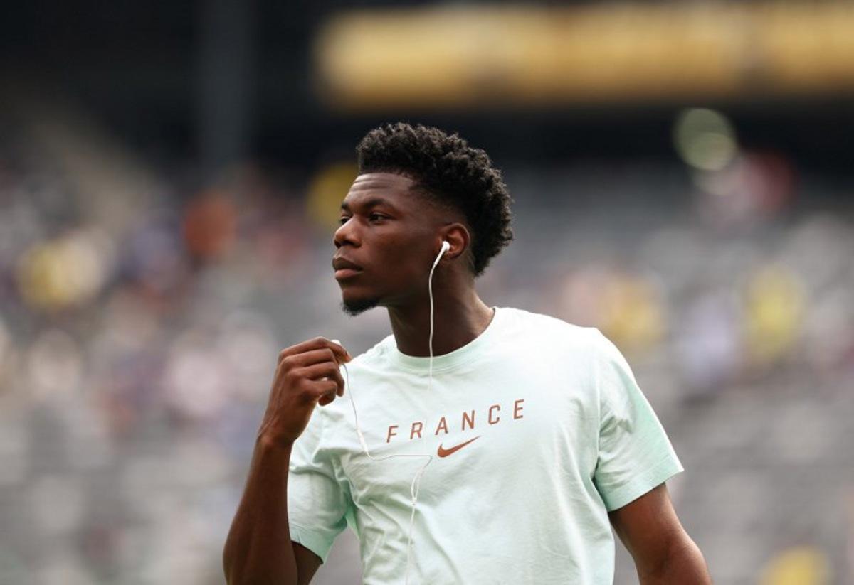 France's midfielder #08 Aurelien Tchouameni walk on he the pitch ahead of the 2026 World Cup round of 32 football match between France and Sweden at the New York/New Jersey Stadium in East Rutherford on June 30, 2026.   FRANCK FIFE / AFP
