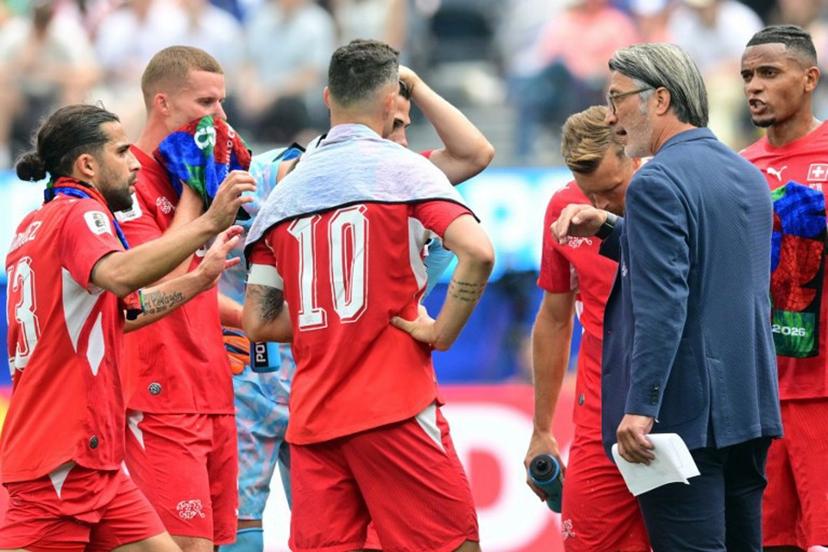 Switzerland's head coach Murat Yakin speaks to his players during the 2026 World Cup Group B football match between Switzerland and Bosnia and Herzegovina at Los Angeles Stadium in Inglewood on June 18, 2026.   Frederic J. Brown / AFP