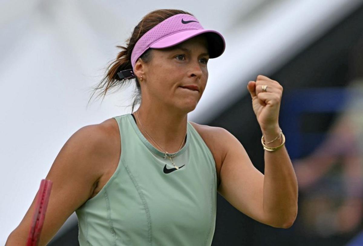 Germany's Tatjana Maria celebrates winning a game in the second set Latvia's Jelena Ostapenko during their women's semi-final tennis match on day five of the Lexus Eastbourne Open at Devonshire Park, Eastbourne, on the south coast of England on June 26, 2026.  Glyn KIRK / AFP