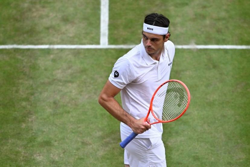 US player Taylor Fritz reacts after winning the first set against Kazakhstan's Alexander Bublik during their men's singles round of 16 tennis match on the eighth day of the 2026 Wimbledon Championships at The All England Lawn Tennis and Croquet Club in Wimbledon, southwest London, on July 6, 2026.  Kirill KUDRYAVTSEV / AFP