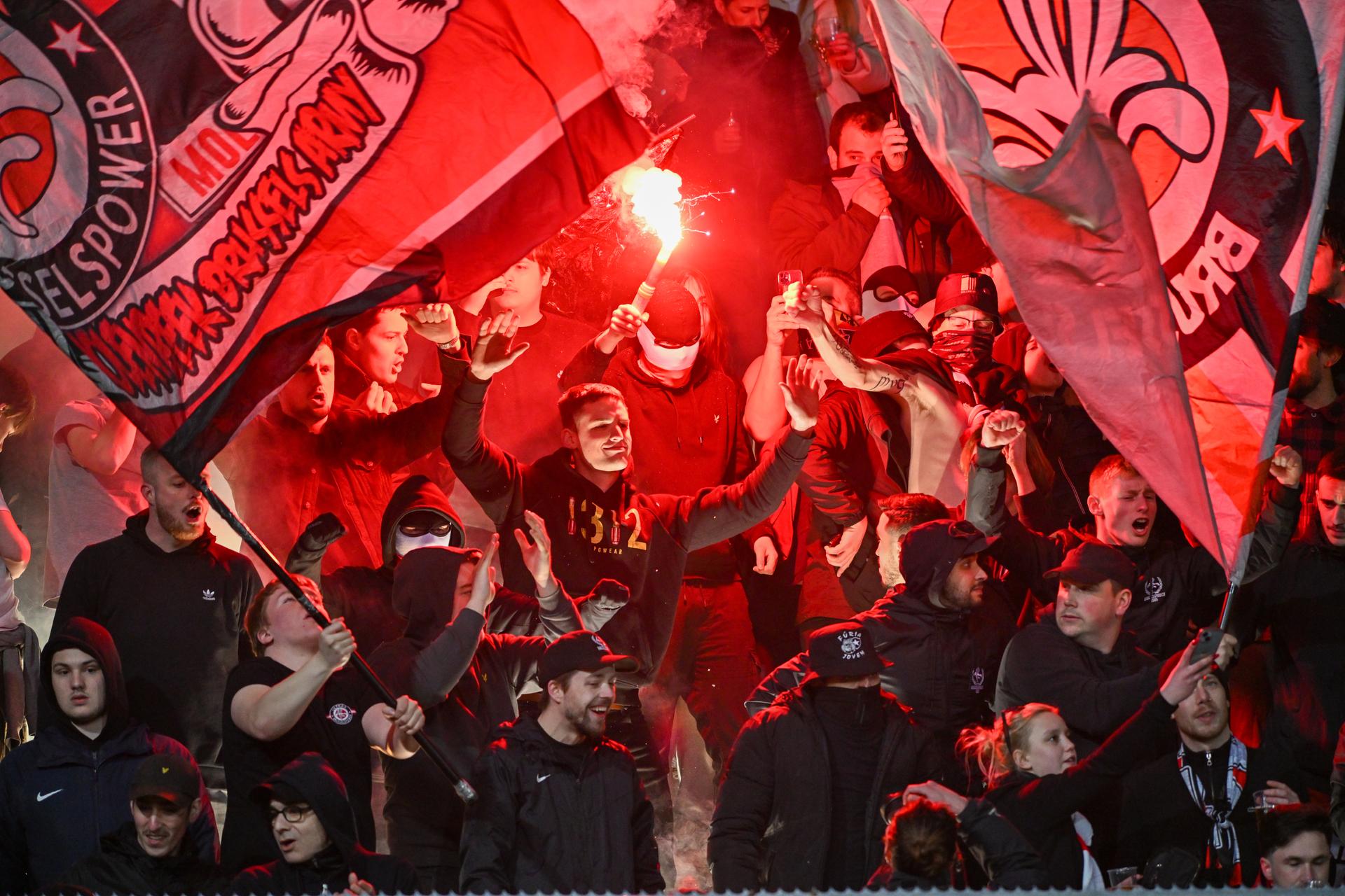 Illustration picture shows RWDM's fans and supporters with pyrotechnical fireworks and smoke bombs during a soccer match between Beerschot VA and RWD Molenbeek, Sunday 02 April 2023 in Antwerp, on day 5 of the Promotion Play-offs during the 2022-2023 'Challenger Pro League' 1B second division of the Belgian championship. BELGA PHOTO DAVID CATRY