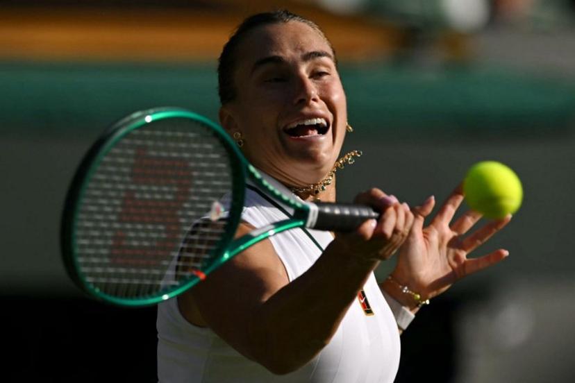 Belarus's Aryna Sabalenka returns to Latvia's Jelena Ostapenko during their women's singles third round tennis match on the fifth day of the 2026 Wimbledon Championships at The All England Lawn Tennis and Croquet Club in Wimbledon, southwest London, on July 3, 2026.  Glyn KIRK / AFP