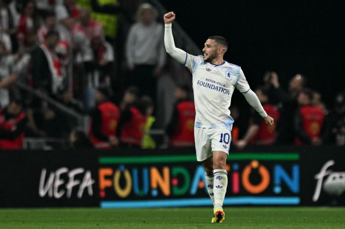 Aston Villa's Argentinian midfielder #10 Emiliano Buendia celebrates scoring the 0-2 goal during the UEFA Europa League final football match between SC Freiburg and Aston Villa at Besiktas Park in Istanbul on May 20, 2026.  OZAN KOSE / AFP