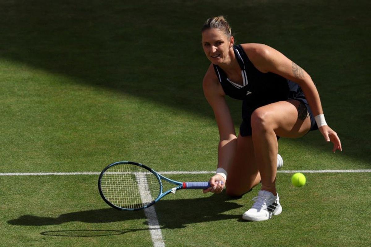 Czech Republic's Karolina Pliskova returns against Croatia's Donna Vekic during their women's singles quarter-final tennis match at the HSBC WTA Championships at Queen's Club in west London on June 12, 2026.  Adrian Dennis / AFP
