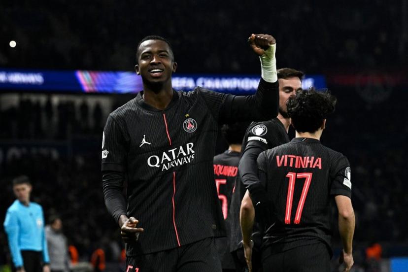 Paris Saint-Germain's Ecuadoran defender #51 Willian Pacho celebrates after scoring his team's fourth goal  during the UEFA Champions League, league phase - matchday 5, football match between Paris Saint-Germain (PSG) and Tottenham Hotspur FC at the Parc des Princes stadium in Paris on November 26, 2025.  JULIEN DE ROSA / AFP