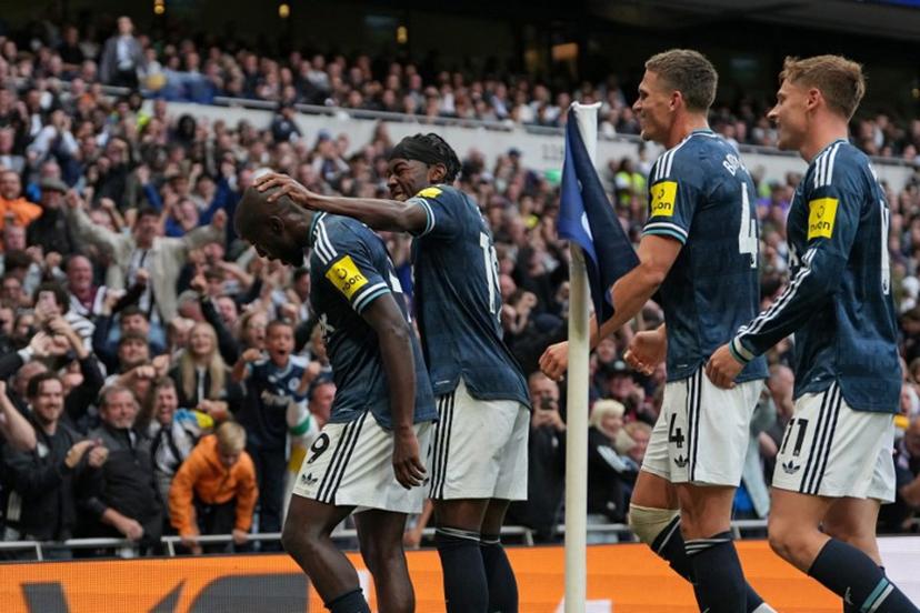 Newcastle United's Congolese striker #09 Yoane Wissa (L) celebrates with teammates after scoring their second goal during the English Premier League football match between Tottenham Hotspur and Newcastle United at the Tottenham Hotspur Stadium in London, on August 29, 2026.  CARLOS JASSO / AFP