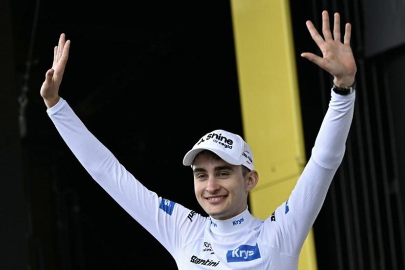 Decathlon CMA CGM Team's French rider Paul Seixas celebrates on the podium with the best young rider's white jersey after the 14th stage of the 113th edition of the Tour de France cycling race, 155,3 km between Mulhouse and Le Markstein in the Vosges mountains, on July 18, 2026.  Loic VENANCE / AFP