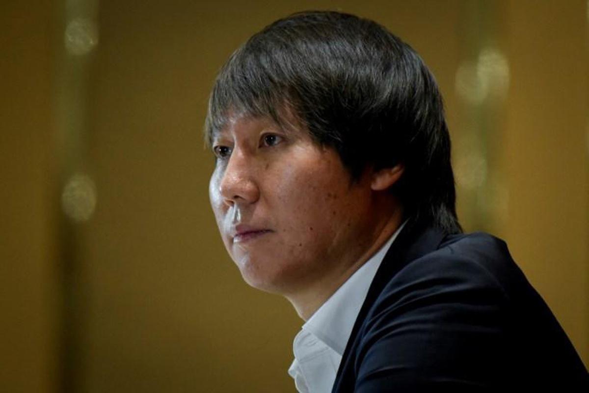 Li Tie, the new head coach of China men's national football team, attends a press conference in Beijing on January 5, 2020.  WANG ZHAO / AFP