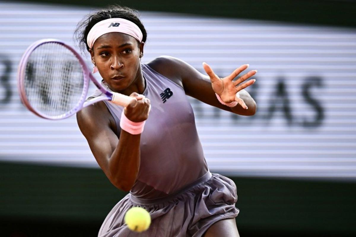 US Coco Gauff plays a forehand return to Austria's Anastasia Potapova during their women's singles match on day 7 of the French Open tennis tournament on Court Philippe-Chatrier at the Roland-Garros Complex in Paris on May 30, 2026.  JULIEN DE ROSA / AFP