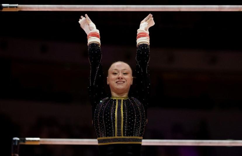 Belgium's Lisa Vaelen competes on the uneven bars during the women's qualifying session at the 53rd FIG Artistic Gymnastics World Championships in Jakarta on October 21, 2025.  Yasuyoshi CHIBA / AFP