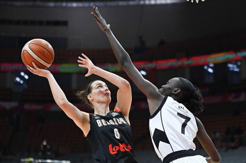 Belgium's Antonia Delaere (L) is blocked by South Sudan's Nyamer Diew during the FIBA Women's Basketball World Cup 2026 qualifying tournament game between Belgium and South Sudan in Wuhan, in China's central Hubei province, on March 15, 2026.  CN-STR / AFP