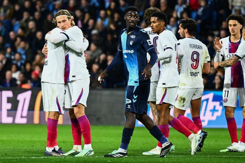 PSG's Belgian forward #22 Mika Godts (2L) celebrates scoring his team's first goal during the French L1 football match between Le Havre Athletic Club and Paris Saint-Germain (PSG) at Stade Oceane in Le Havre, north-western France on October 30, 2026.  Guillaume SALIGOT / AFP
