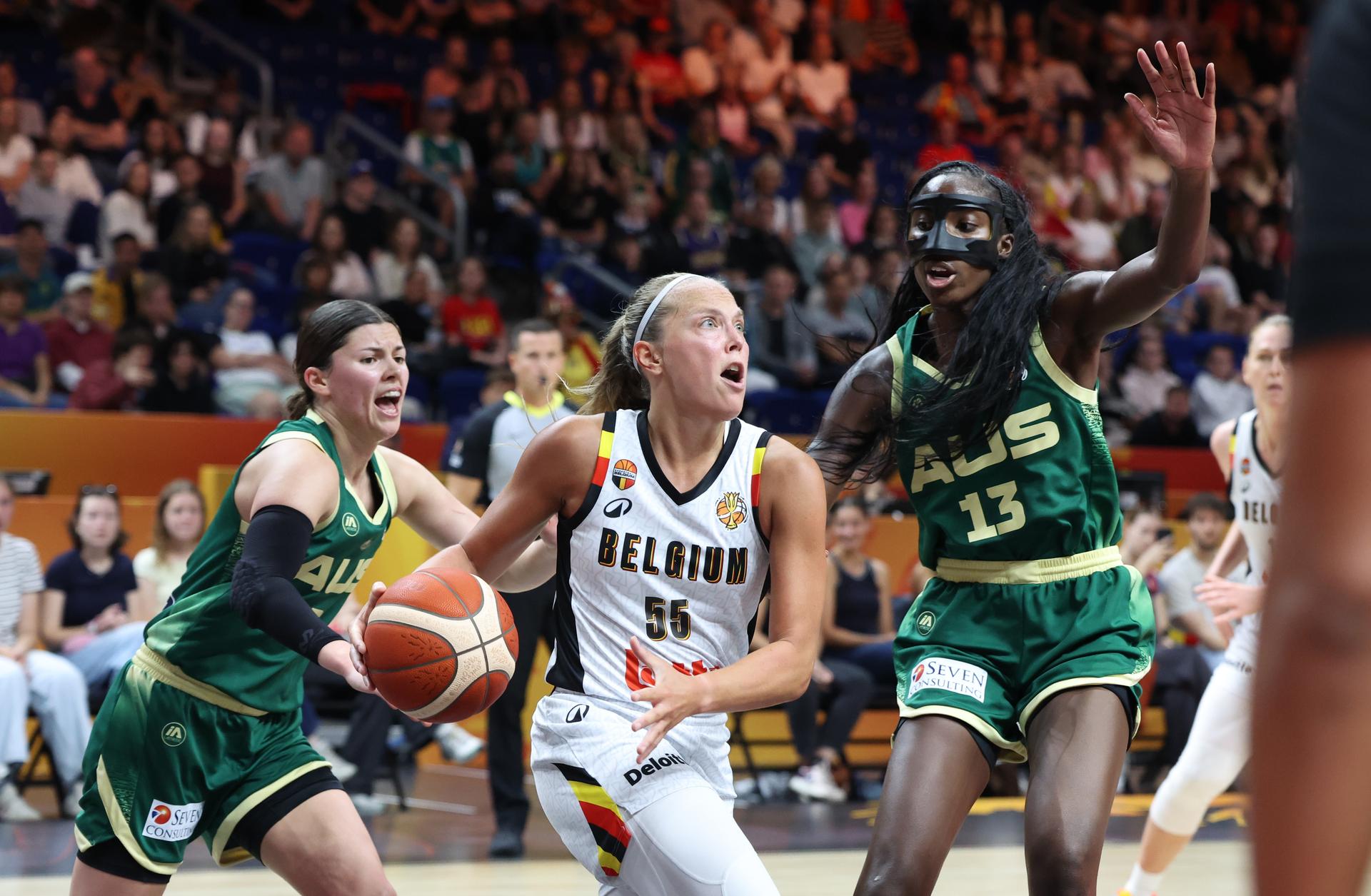Belgium's Julie Allemand and Australia' Ezi Magbegor fight for the ball during a basketball game between Belgian national team Belgian Cats and Australia,  game 3 of the group phase at the FIBA Women's Basketball World Cup, on Monday 7 September 2026, in Berlin, Germany. The FIBA Women's Basketball World Cup takes place in Berlin from 4 to 23 September 2026. BELGA PHOTO VIRGINIE LEFOUR