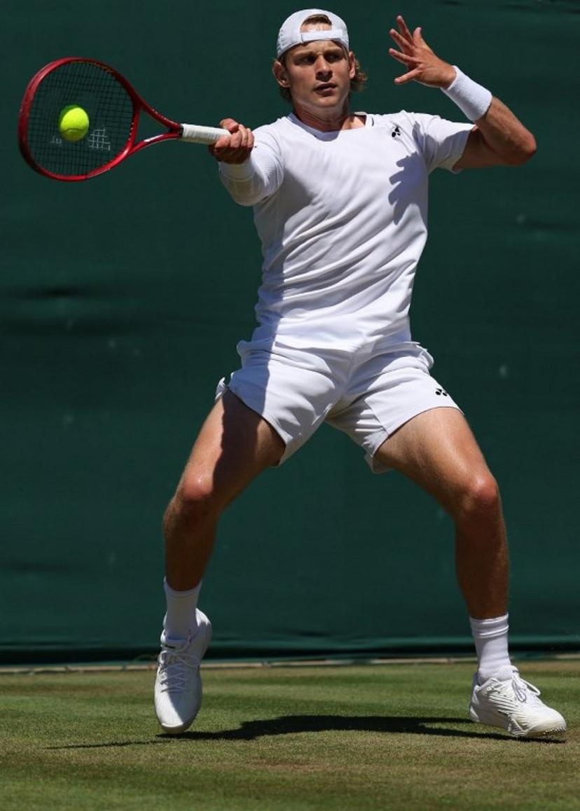 Belgium's Zizou Bergs returns against Portugal's Jaime Faria during their men's singles second round tennis match on the fourth day of the 2026 Wimbledon Championships at The All England Lawn Tennis and Croquet Club in Wimbledon, southwest London, on July 2, 2026.  Adrian Dennis / AFP