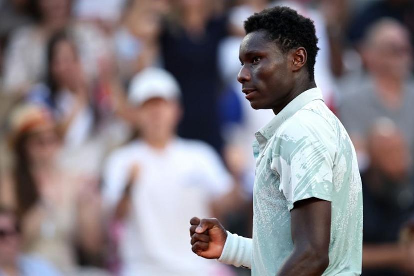 France's Moise Kouame reacts to a point against Chile's Alejandro Tabilo during their men's singles match on day 7 of the French Open tennis tournament on Court Suzanne-Lenglen at the Roland-Garros Complex in Paris on May 30, 2026.  Anne-Christine POUJOULAT / AFP