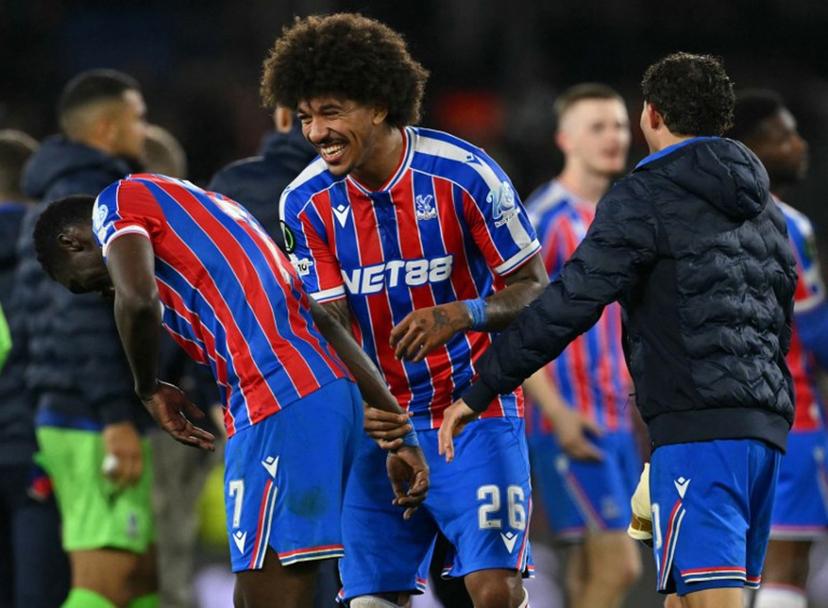 Crystal Palace's Senegalese midfielder #07 Ismaila Sarr (L), Crystal Palace's US defender #26 Chris Richards (C) and Crystal Palace's Spanish midfielder #10 Yeremy Pino celebrate at the full-time whistle during the UEFA Conference semi-final second-leg football match between Crystal Palace and Shakhtar Donetsk at Selhurst Park in London on May 7, 2026.  Glyn KIRK / AFP