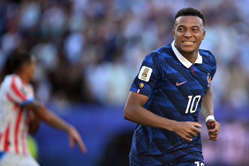 France's forward #10 Kylian Mbappe reacts to a missed chance during the 2026 World Cup round of 16 football match between Paraguay and France at the Philadelphia Stadium in Philadelphia on July 4, 2026.   MAURO PIMENTEL / AFP