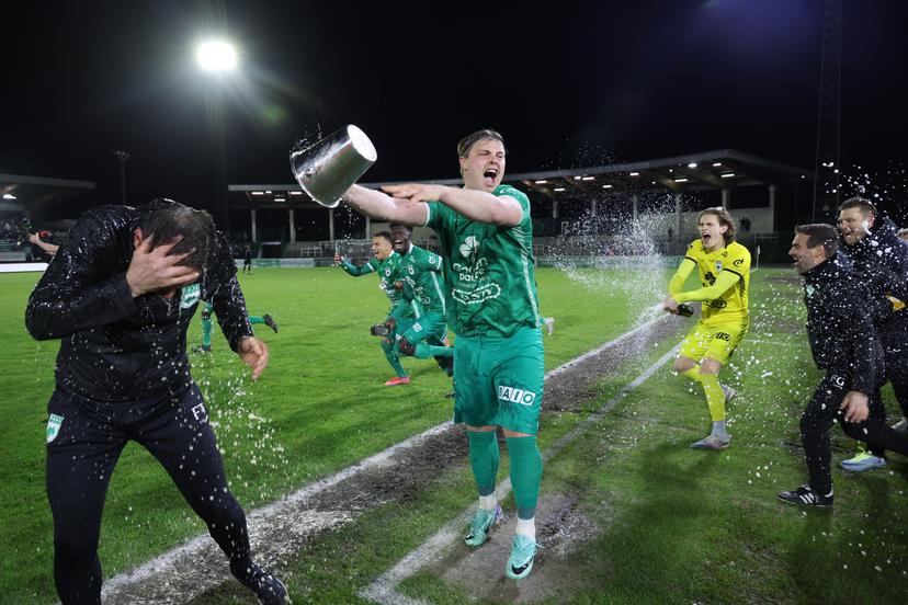 RAAL's head coach Frederic Taquin and RAAL's Jorn Vancamp celebrate after winning a match between RAAL La Louviere and Jong Gent (KAA Gent), in the Belgian National Division 1 (Eerste Nationale), in La Louviere, Saturday 20 April 2024. BELGA PHOTO VIRGINIE LEFOUR