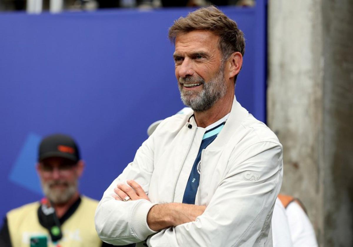 (FILES) German coach Jurgen Klopp attends the FIFA World Cup 2026 Group E match between Germany and Curacao at Houston Stadium on June 14, 2026 in Houston, Texas. Jurgen Klopp insisted on July 4, 2026 he was recharged and "ready" for what he said would be "intensive discussions" over becoming the new coach of Germany. Klopp told the German FA (DFB) on July 3 that he was "fundamentally willing" to take over as Germany's coach after Julian Nagelsmann resigned.  ALEXANDER HASSENSTEIN / GETTY IMAGES NORTH AMERICA / AFP