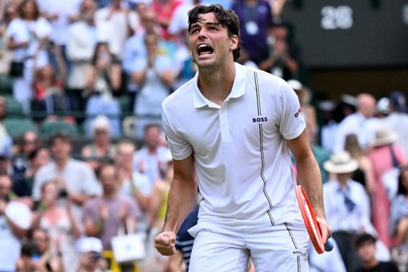 US player Taylor Fritz celebrates winning against Kazakhstan's Alexander Bublik during their men's singles round of 16 tennis match on the eighth day of the 2026 Wimbledon Championships at The All England Lawn Tennis and Croquet Club in Wimbledon, southwest London, on July 6, 2026.  Kirill KUDRYAVTSEV / AFP