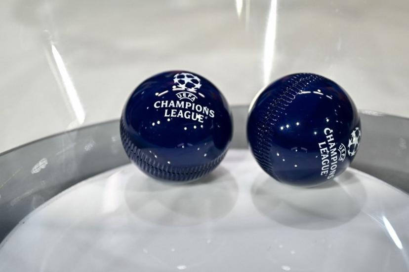 This photograph shows the draw balls bearing the competition logo ahead of the 2025-2026 UEFA Champions League round of 16, quarter-final and semi-final draw at the House of European Football in Nyon, western Switzerland on February 27, 2026.  Harold CUNNINGHAM / AFP