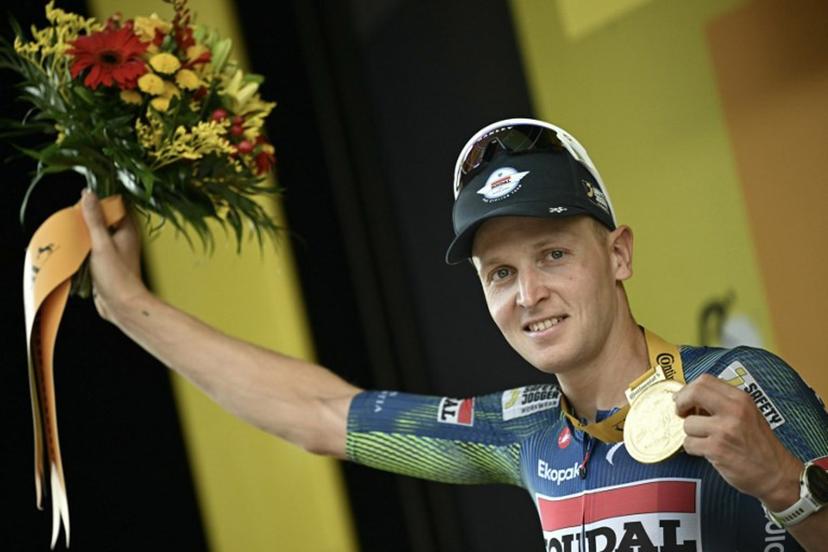 Soudal Quick-Step team's Belgian rider Tim Merlier celebrates on the podium after winning the 12th stage of the 113th edition of the Tour de France cycling race, 179,1 km between Circuit de Nevers Magny-Cours and Chalon-sur-Saône in central France, on July 16, 2026.  Loic VENANCE / AFP
