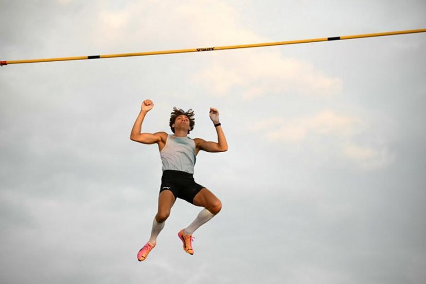 Sweden's Armand Duplantis clears the bar as he competes in the men's Pole Vault during the World Athletics Diamond League athletics meeting at the Stade Olympique de la Pontaise in Lausanne, on August 20, 2026.  Fabrice COFFRINI / AFP