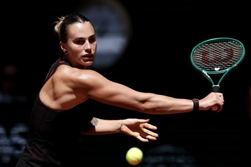 Belarus' Aryna Sabalenka plays a backhand return to Spain's Jessica Bouzas Maneiro during their women's singles match on day 3 of the French Open tennis tournament on Court Philippe-Chatrier at the Roland-Garros Complex in Paris on May 26, 2026.  Anne-Christine POUJOULAT / AFP