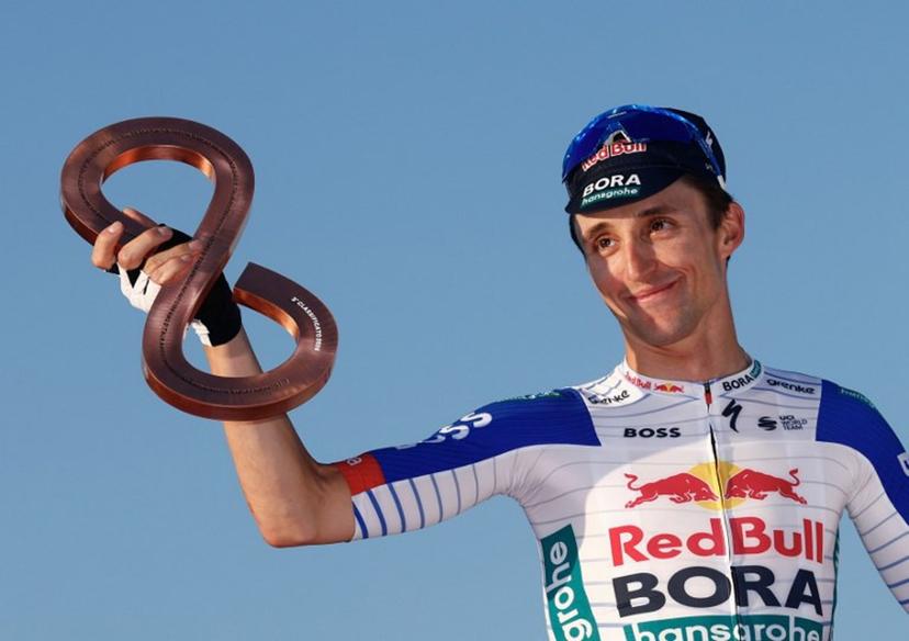 Third placed Red Bull - BORA - hansgrohe Australian rider Jai Hindley celebrates on the podium of the Giro d'Italia 2026 - Tour of Italy, in Rome, Italy, on May 31, 2026  Luca Bettini / AFP