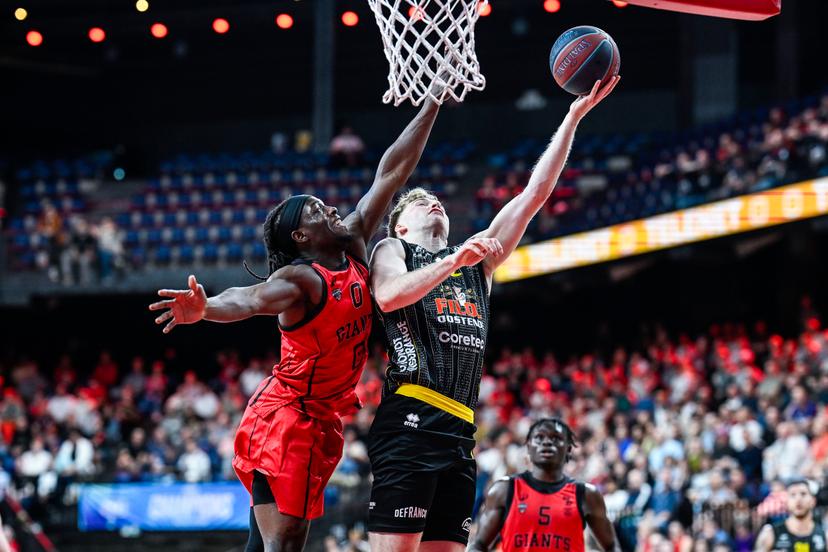 Antwerp's Rasheed Bello and Oostende's Joppe Mennes pictured in action during a basketball match between Antwerp Giants and BC Oostende, Thursday 04 June 2026, in Antwerp, on the first round (out of 5) of the Final of the Playoffs of the 'BNXT League' Belgian/ Dutch first division basket championship. BELGA PHOTO TOM GOYVAERTS